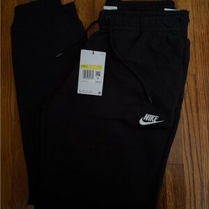 Nike Black women’s' Fleece Joggers with White Swoosh